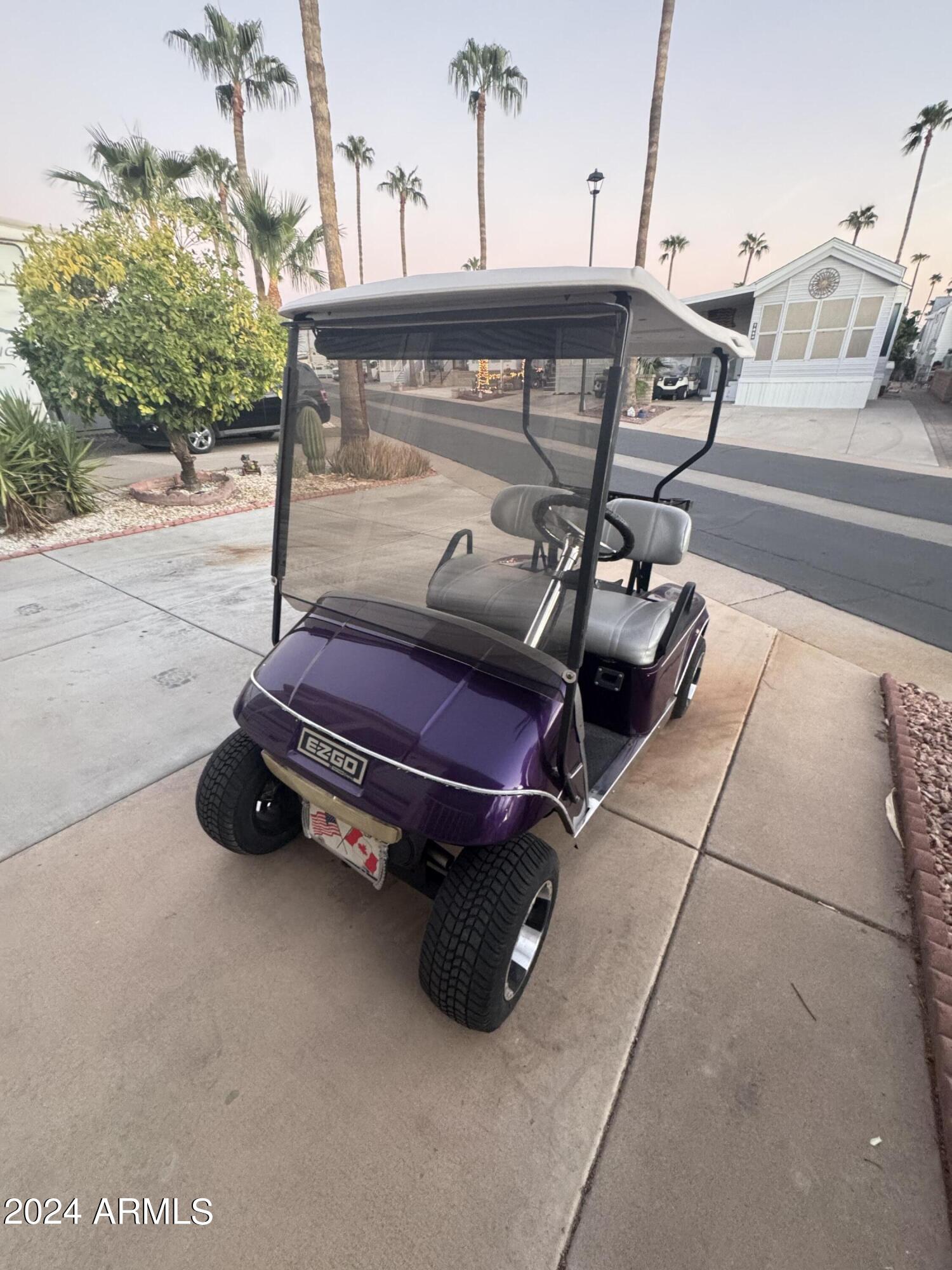 262 West Kiowa Circle Apache Junction, AZ 85119 - Photo 13 of 13 a backyard of a house with barbeque oven table and chairs