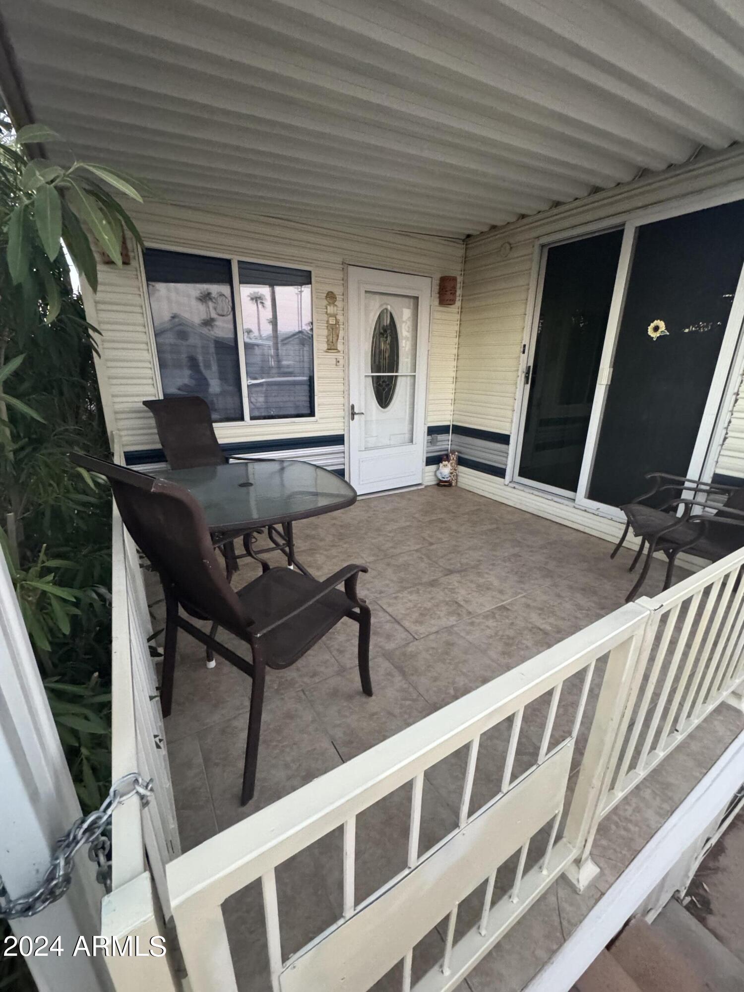 262 West Kiowa Circle Apache Junction, AZ 85119 - Photo 2 of 13 a outdoor space with chairs