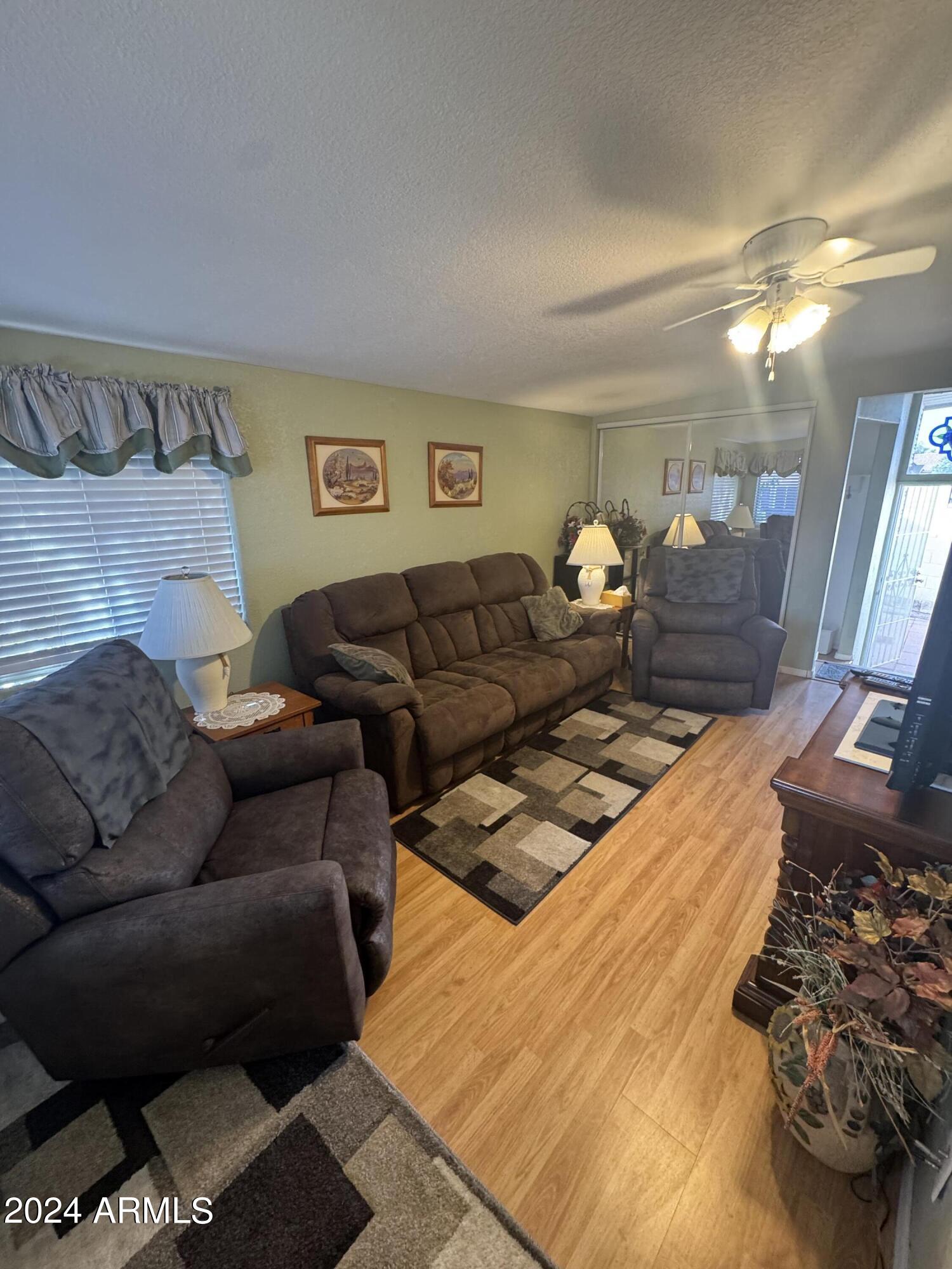 262 West Kiowa Circle Apache Junction, AZ 85119 - Photo 3 of 13 a living room with furniture