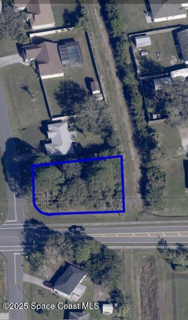 1797 Tharp Road Palm Bay, FL 32909 - Photo 1 of 1 a view of painting on the wall