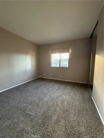 a view of storage and utility room with washer and dryer