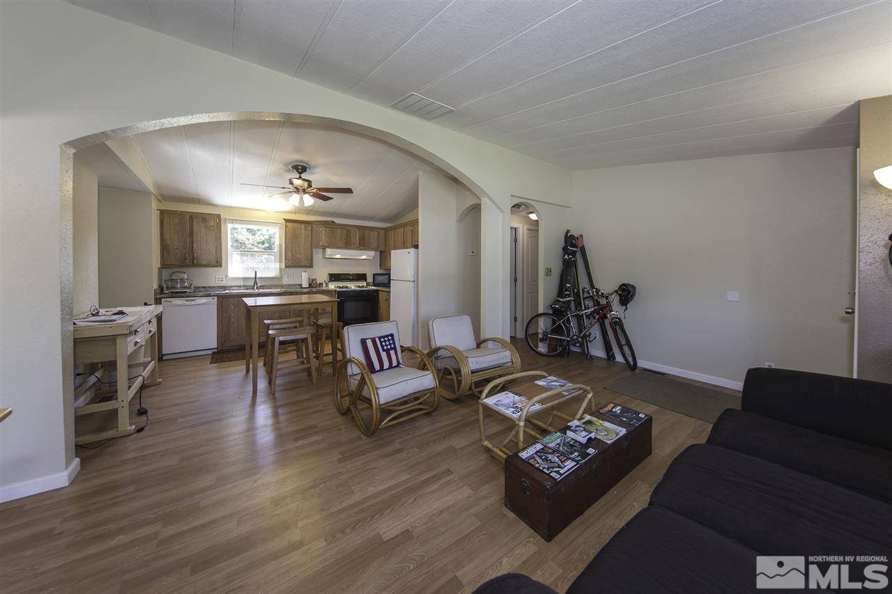 17235 Sunbird Lane Reno, NV 89508 - Photo 7 of 15 a living room with furniture and wooden floor