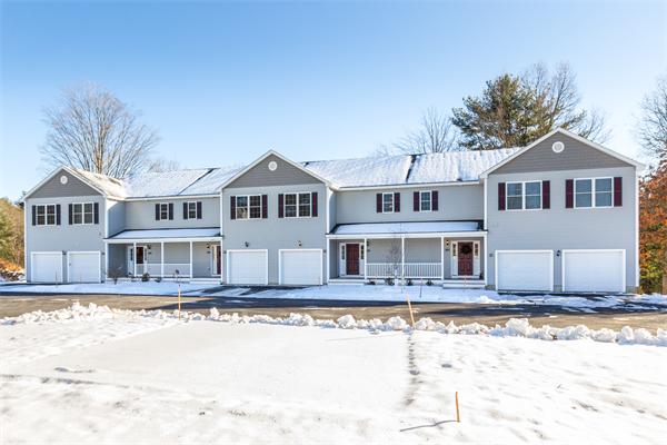 90 Rangeway Road, Unit 203 Billerica, MA 01862 - Photo 1 of 25 a front view of a house with a yard