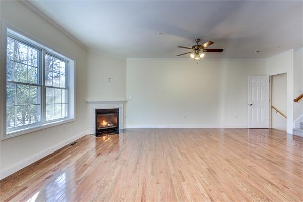 90 Rangeway Road, Unit 203 Billerica, MA 01862 - Photo 17 of 25 wooden floor in an empty room with a window