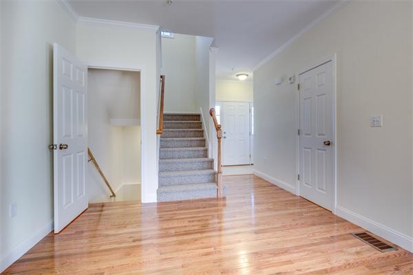 90 Rangeway Road, Unit 203 Billerica, MA 01862 - Photo 6 of 25 a view of entryway with wooden floor