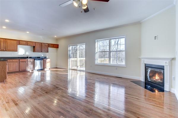 90 Rangeway Road, Unit 203 Billerica, MA 01862 - Photo 10 of 25 a view of a livingroom with furniture and a fireplace
