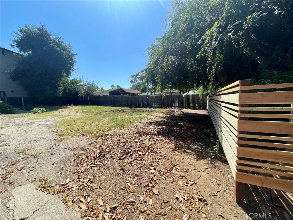 536 Cypress Avenue Pasadena, CA 91103 - Photo 13 of 14 a view of a yard with wooden fence