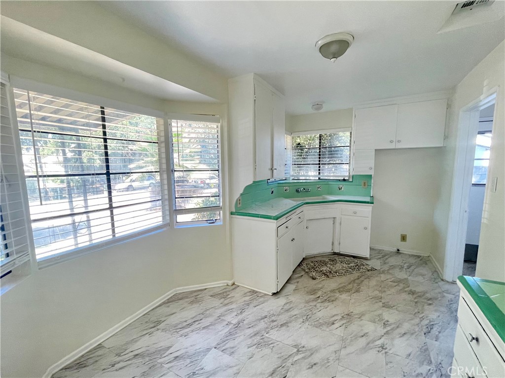 536 Cypress Avenue Pasadena, CA 91103 - Photo 5 of 14 a room with a sink and a window
