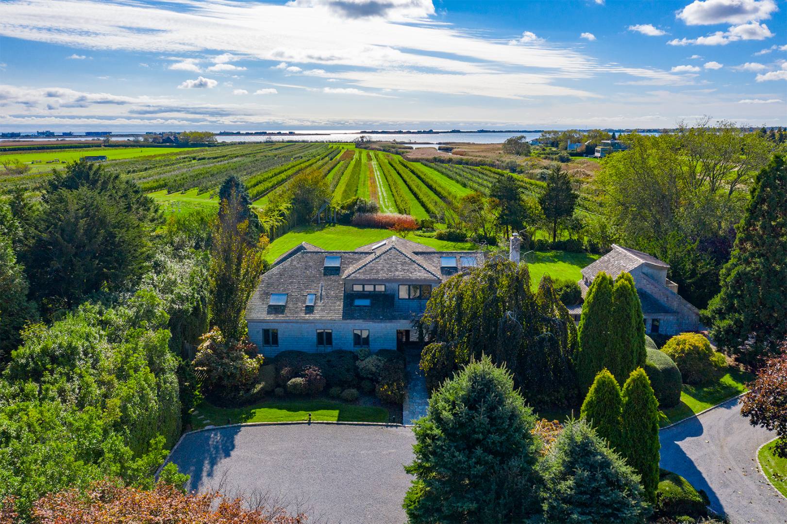 677 Mecox Road Water Mill, NY 11976 - Photo 2 of 24 a view of a house with a yard