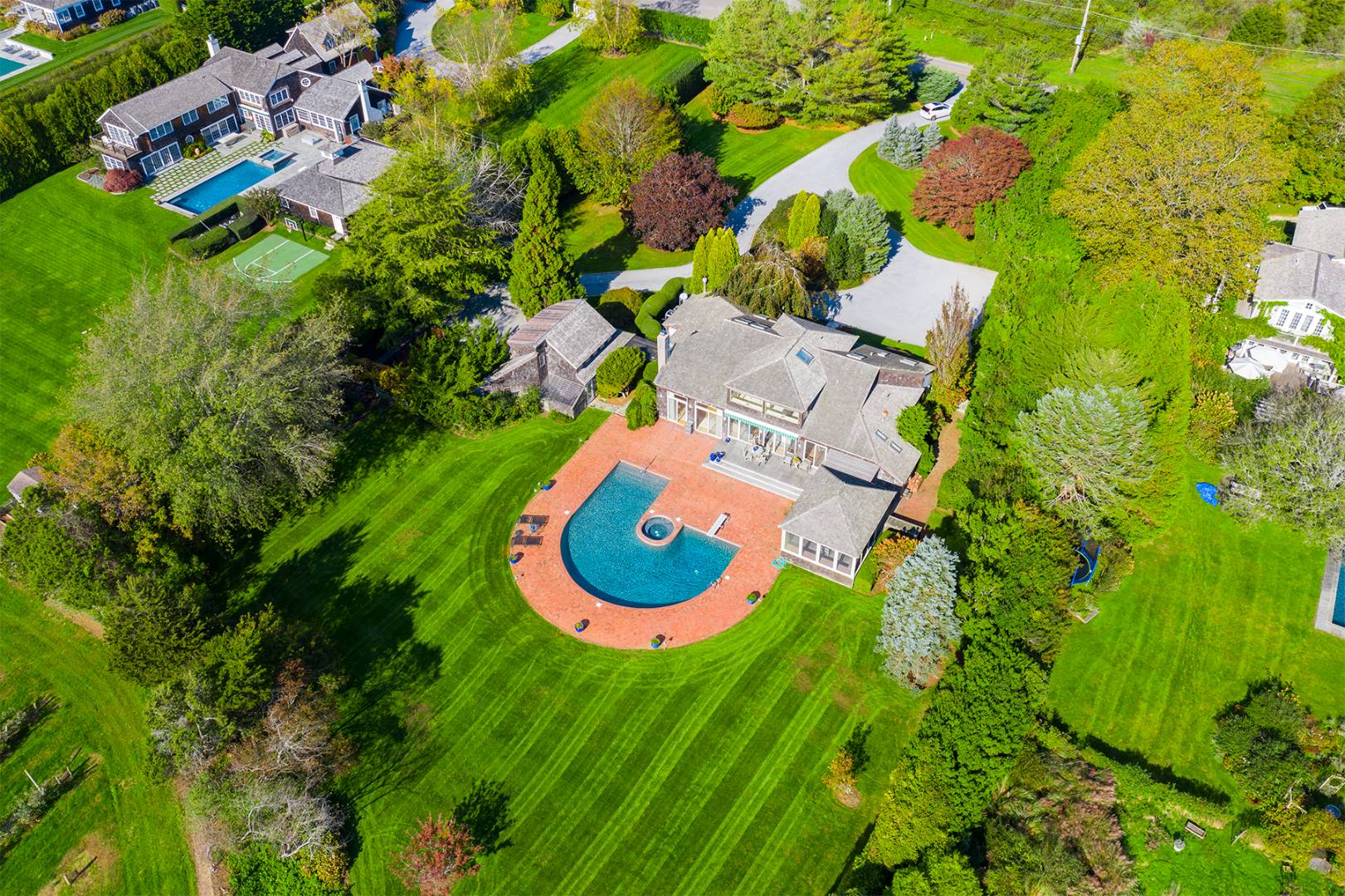 677 Mecox Road Water Mill, NY 11976 - Photo 12 of 24 an aerial view of a house with pool yard and outdoor seating