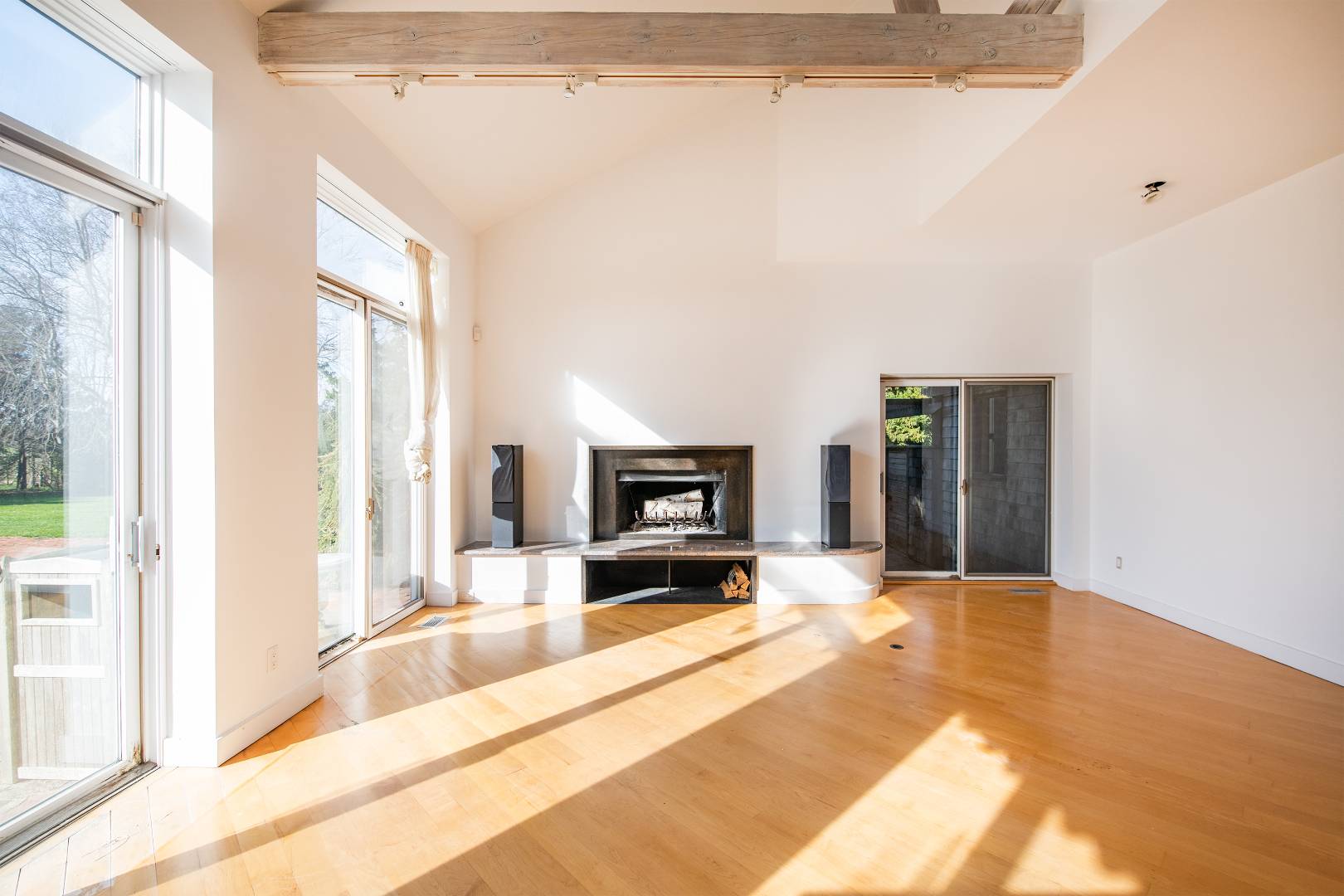 677 Mecox Road Water Mill, NY 11976 - Photo 20 of 24 a large white kitchen with sink and a large window