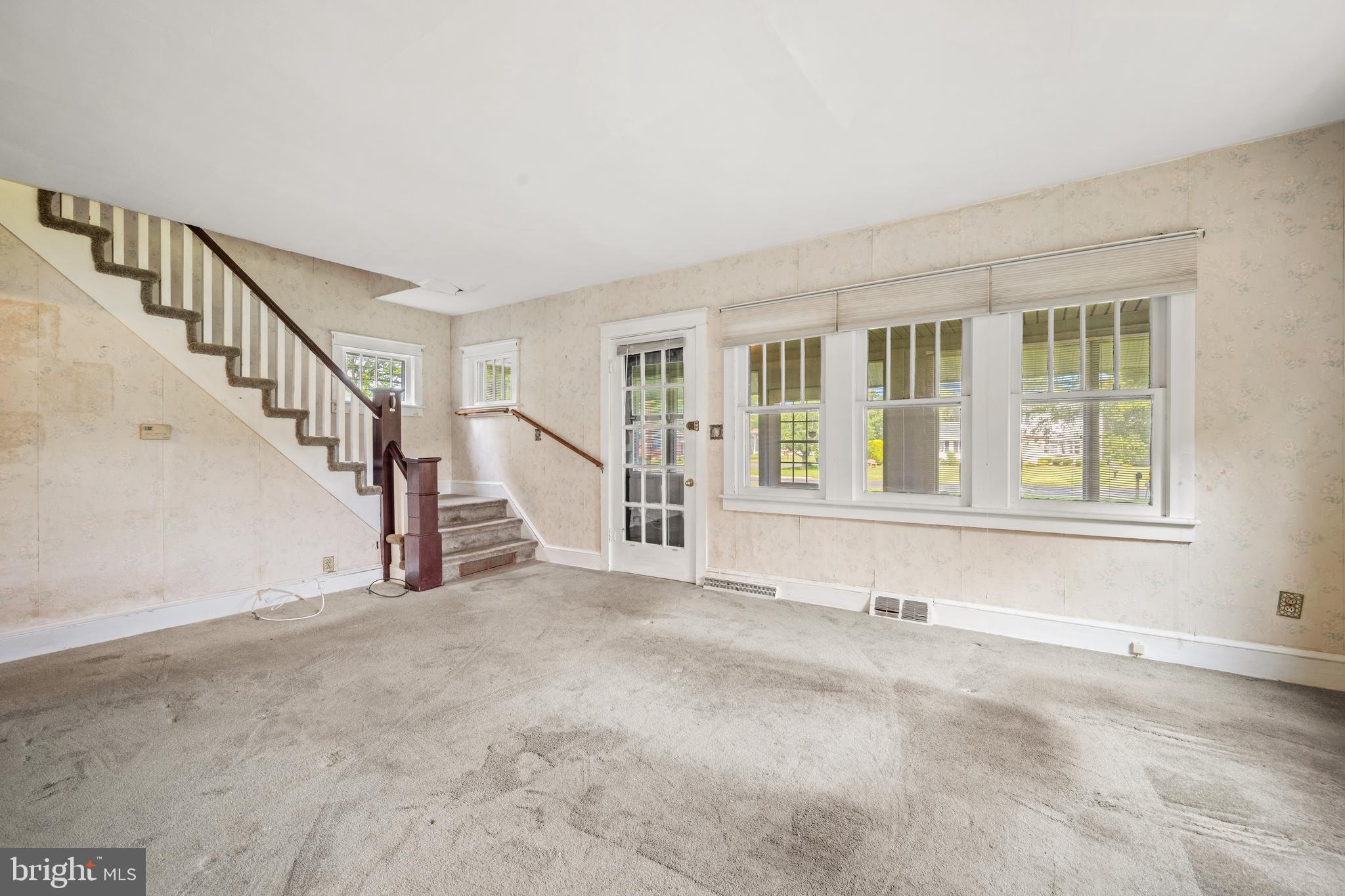 668 South Spring Road Vineland, NJ 08361 - Photo 12 of 24 a view of an empty room with stairs