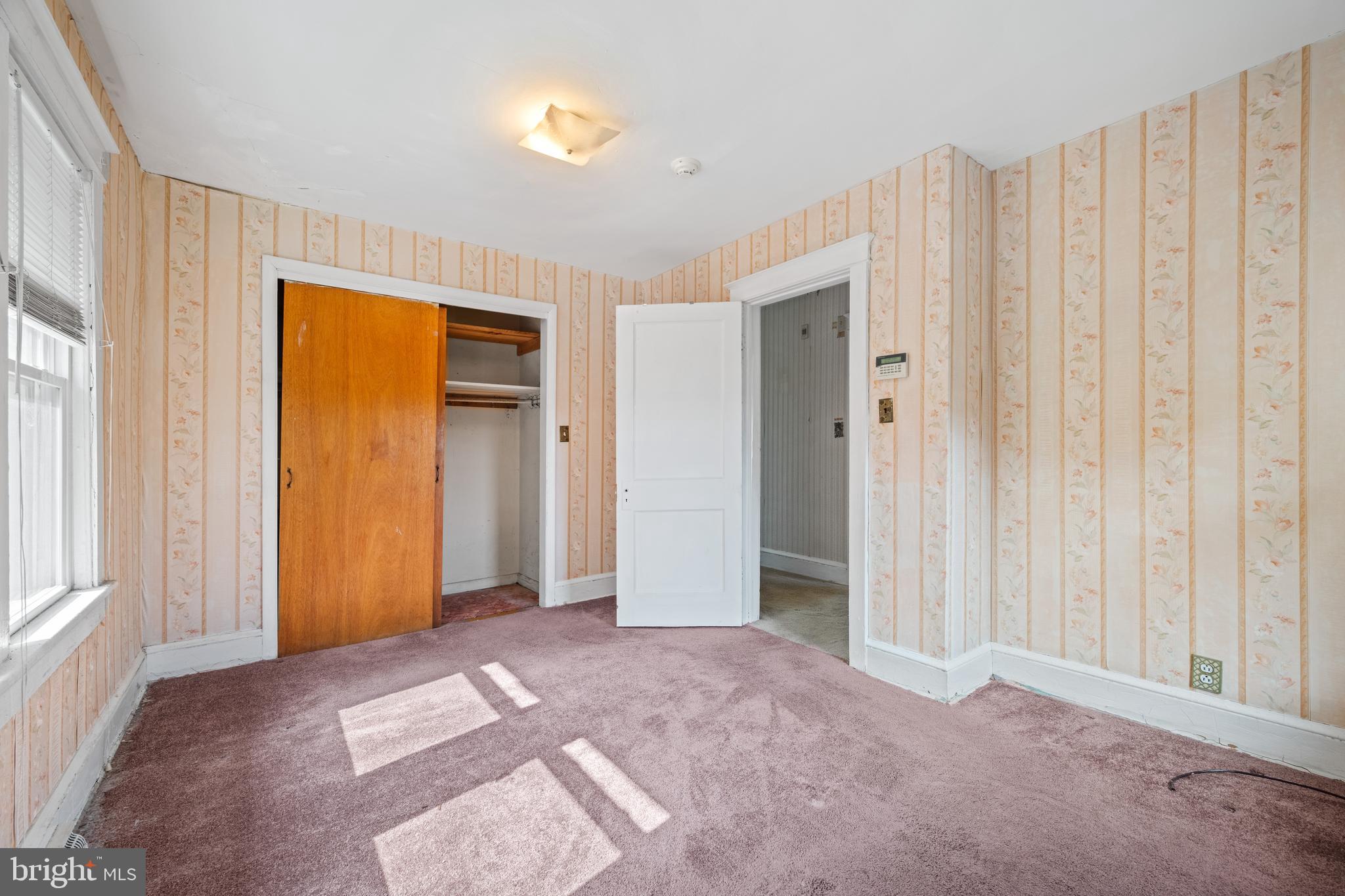 668 South Spring Road Vineland, NJ 08361 - Photo 20 of 24 a view of a livingroom with wooden floor and closet area