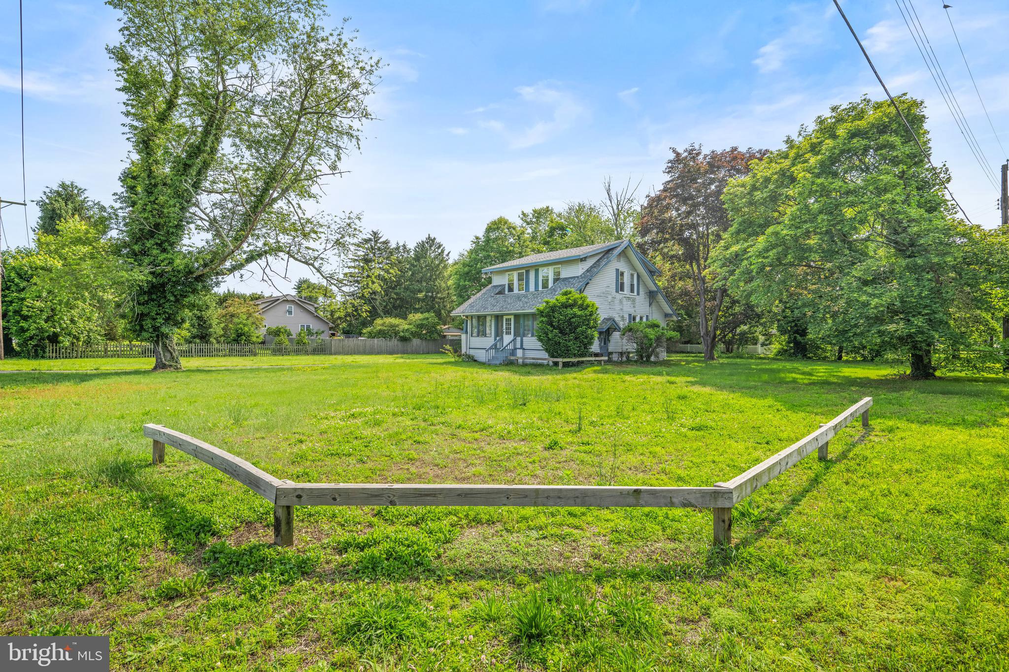 668 South Spring Road Vineland, NJ 08361 - Photo 3 of 24 a view of a tennis ground with large trees