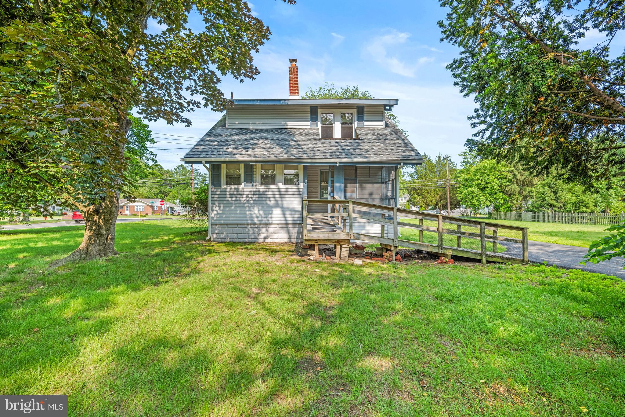 668 South Spring Road Vineland, NJ 08361 - Photo 5 of 24 a view of a house with a yard and sitting area