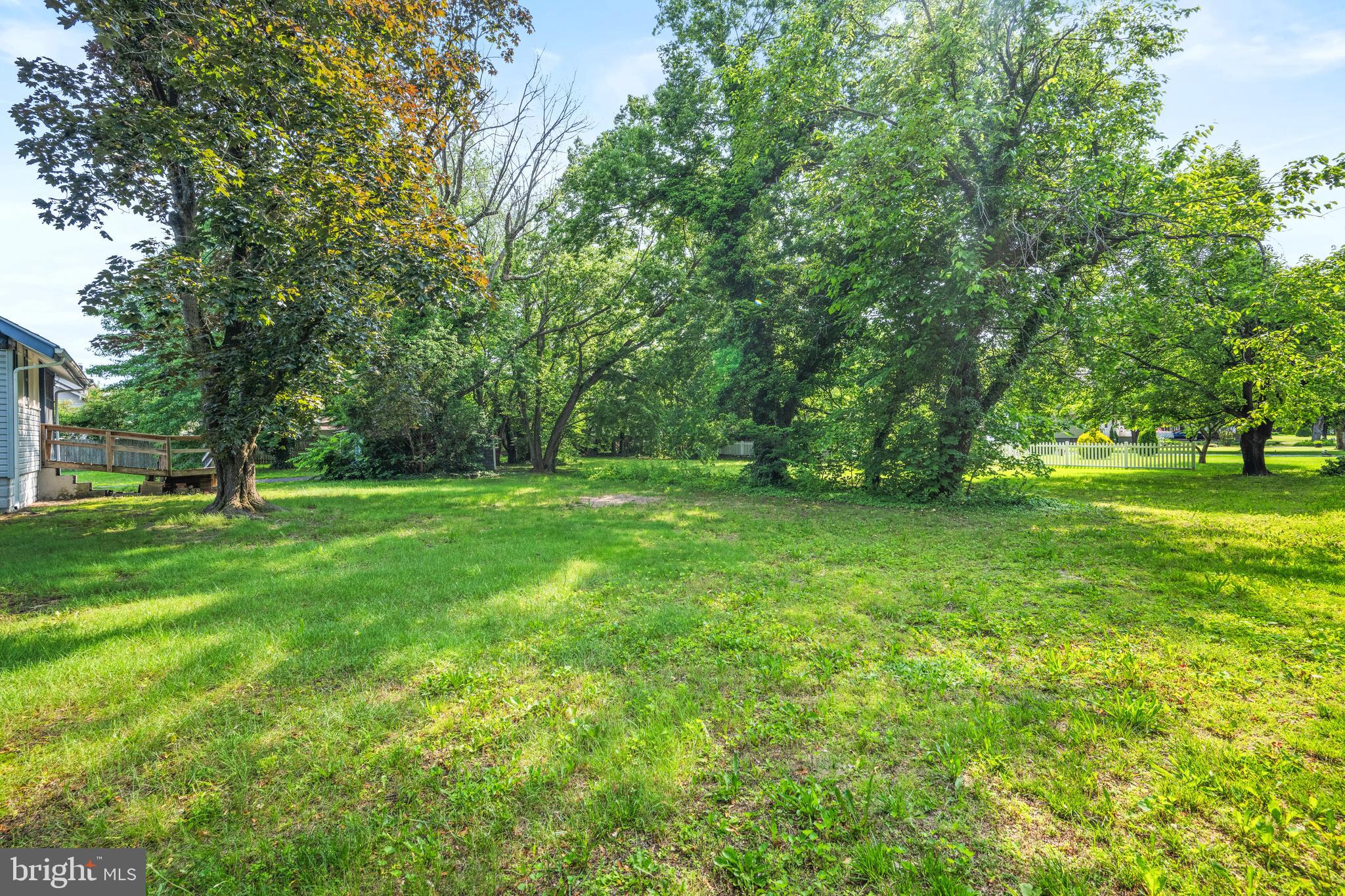668 South Spring Road Vineland, NJ 08361 - Photo 7 of 24 a view of green field with trees in the background