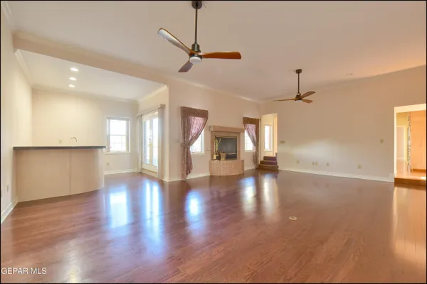 a view of an empty room with a window