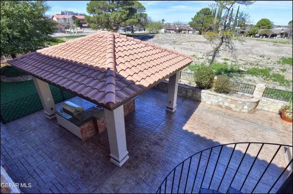 an aerial view of a houses with a yard