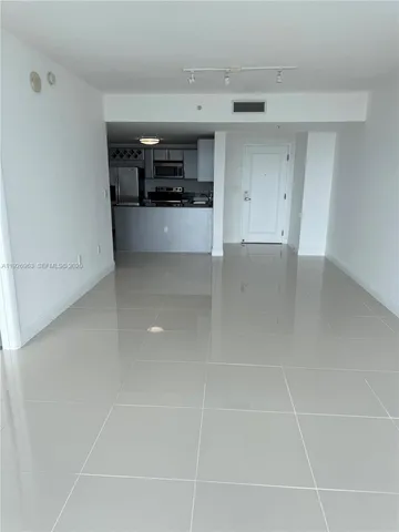 a view of a kitchen and utility room