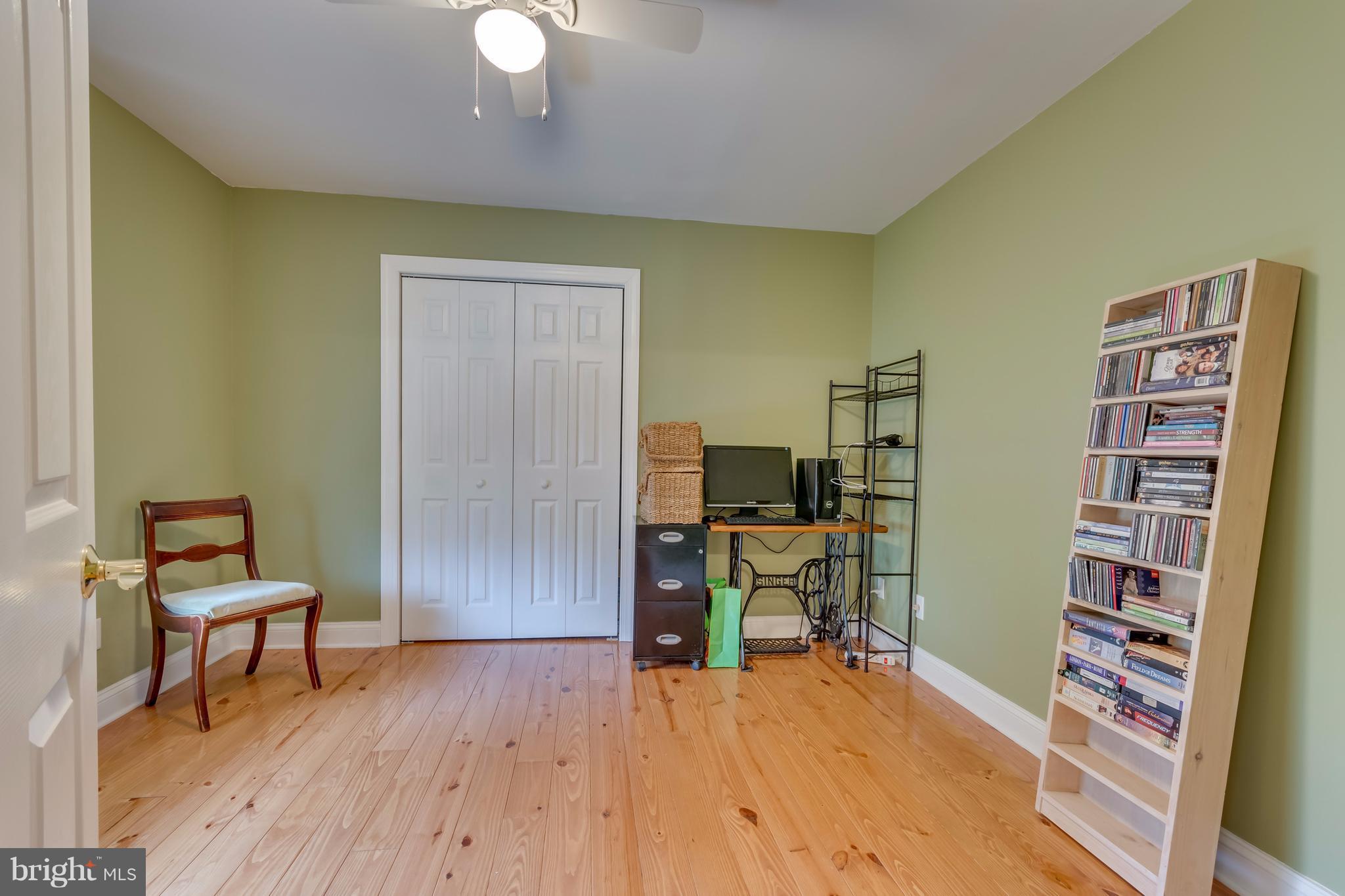 130 Raft Court Inwood, WV 25428 - Photo 14 of 24 a view of a workspace with furniture and wooden floor