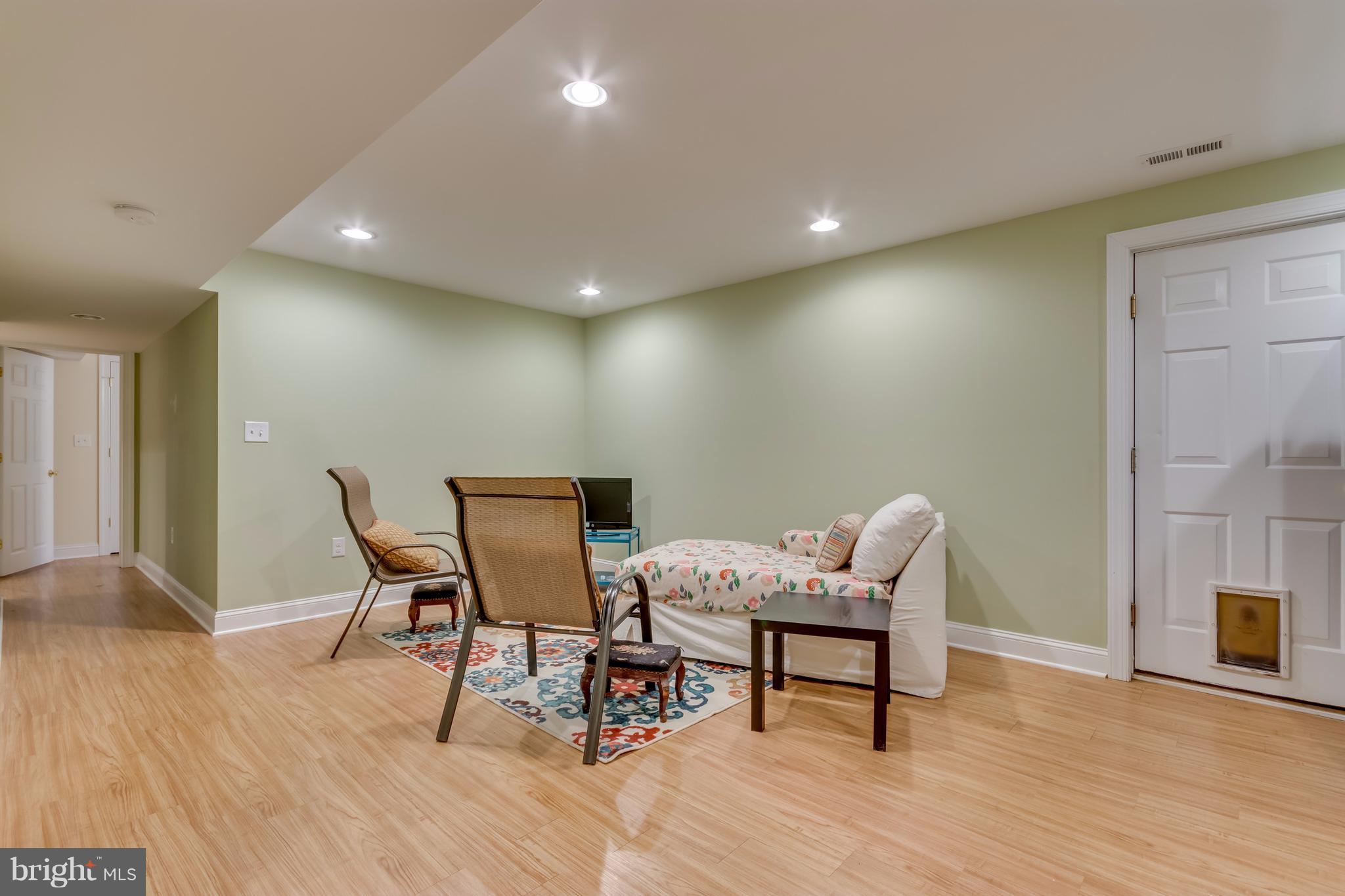 130 Raft Court Inwood, WV 25428 - Photo 16 of 24 a dining room with furniture and wooden floor