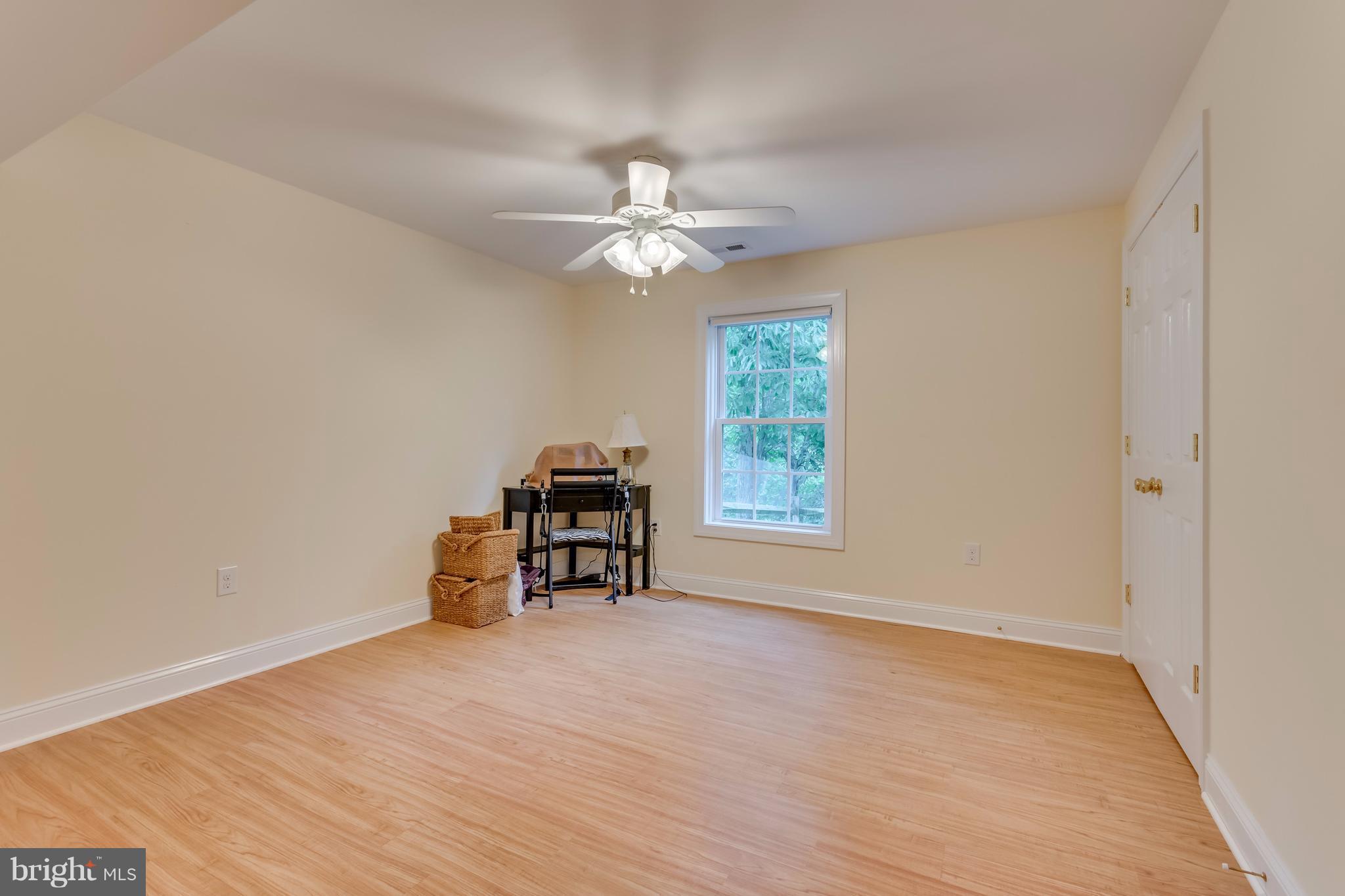 130 Raft Court Inwood, WV 25428 - Photo 20 of 24 an empty room with windows and fan
