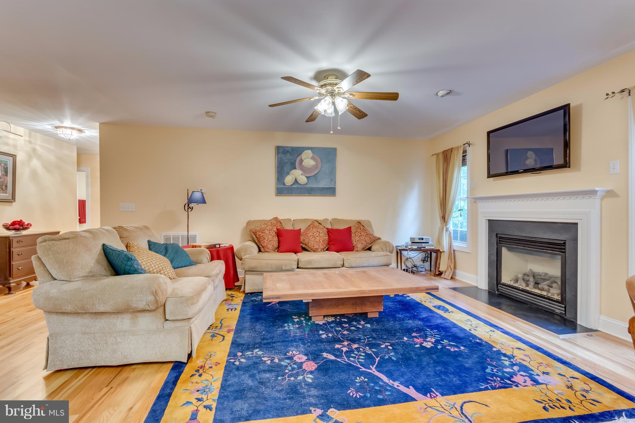130 Raft Court Inwood, WV 25428 - Photo 6 of 24 a living room with furniture and a fireplace