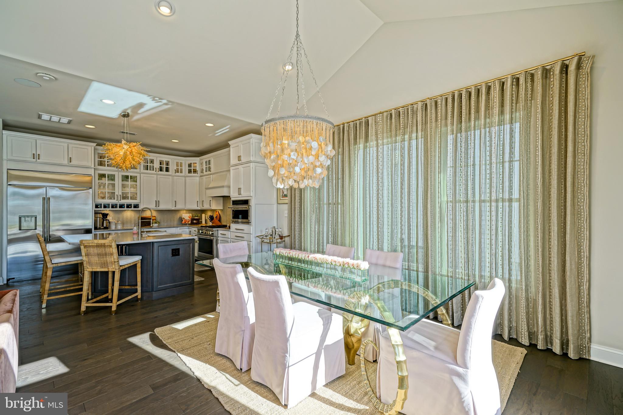 11078 Marvil Road Lewes, DE 19958 - Photo 13 of 98 a view of a dining room with furniture window and outside view