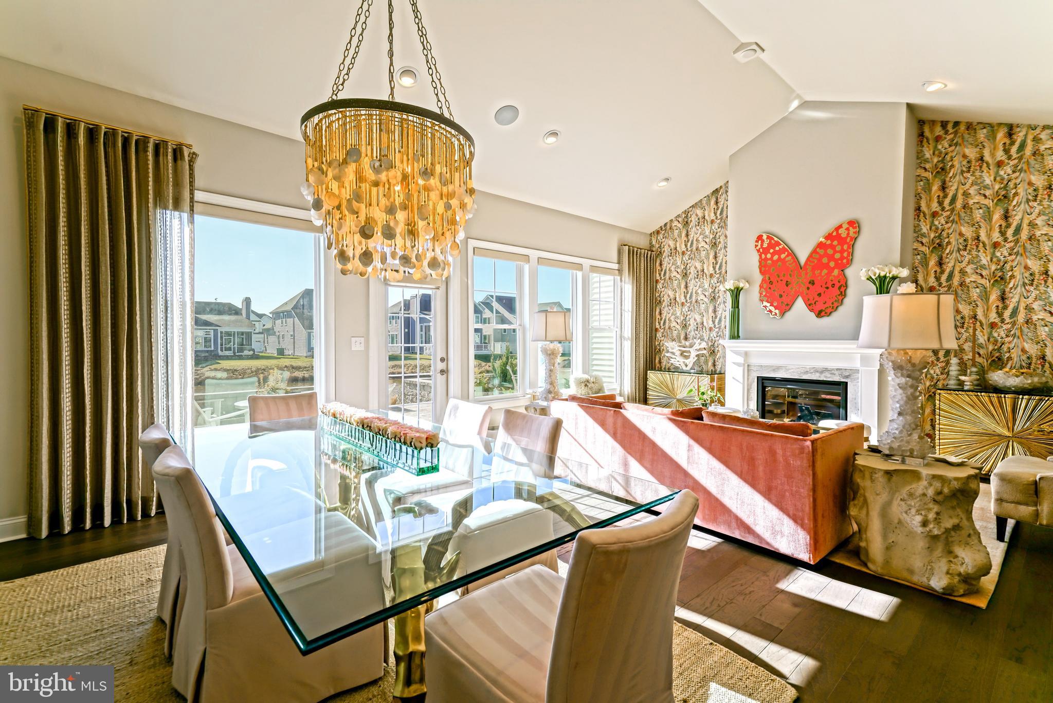 11078 Marvil Road Lewes, DE 19958 - Photo 15 of 98 a view of a dining room with furniture window and outside view