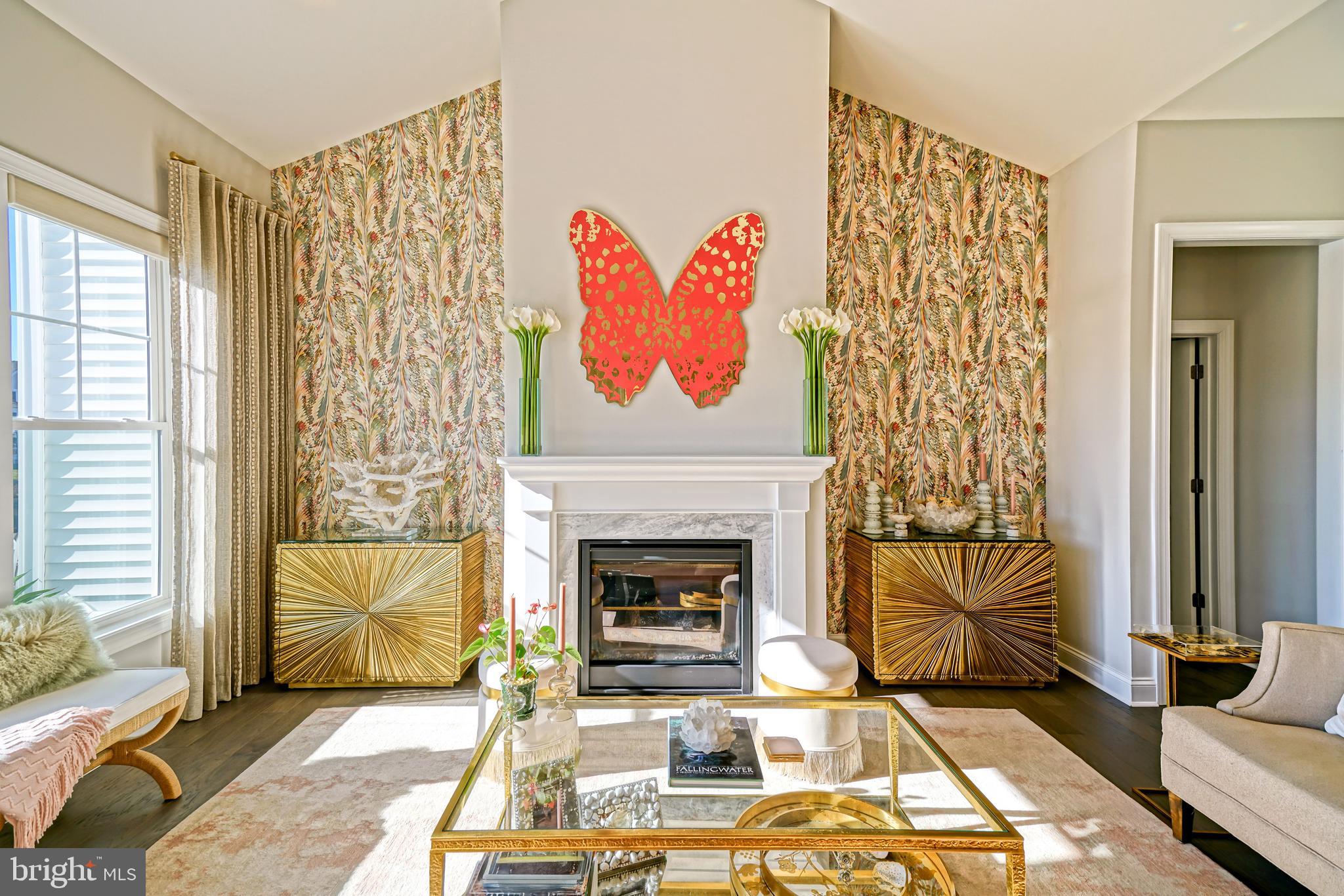 11078 Marvil Road Lewes, DE 19958 - Photo 18 of 98 a living room with a couch and a fireplace