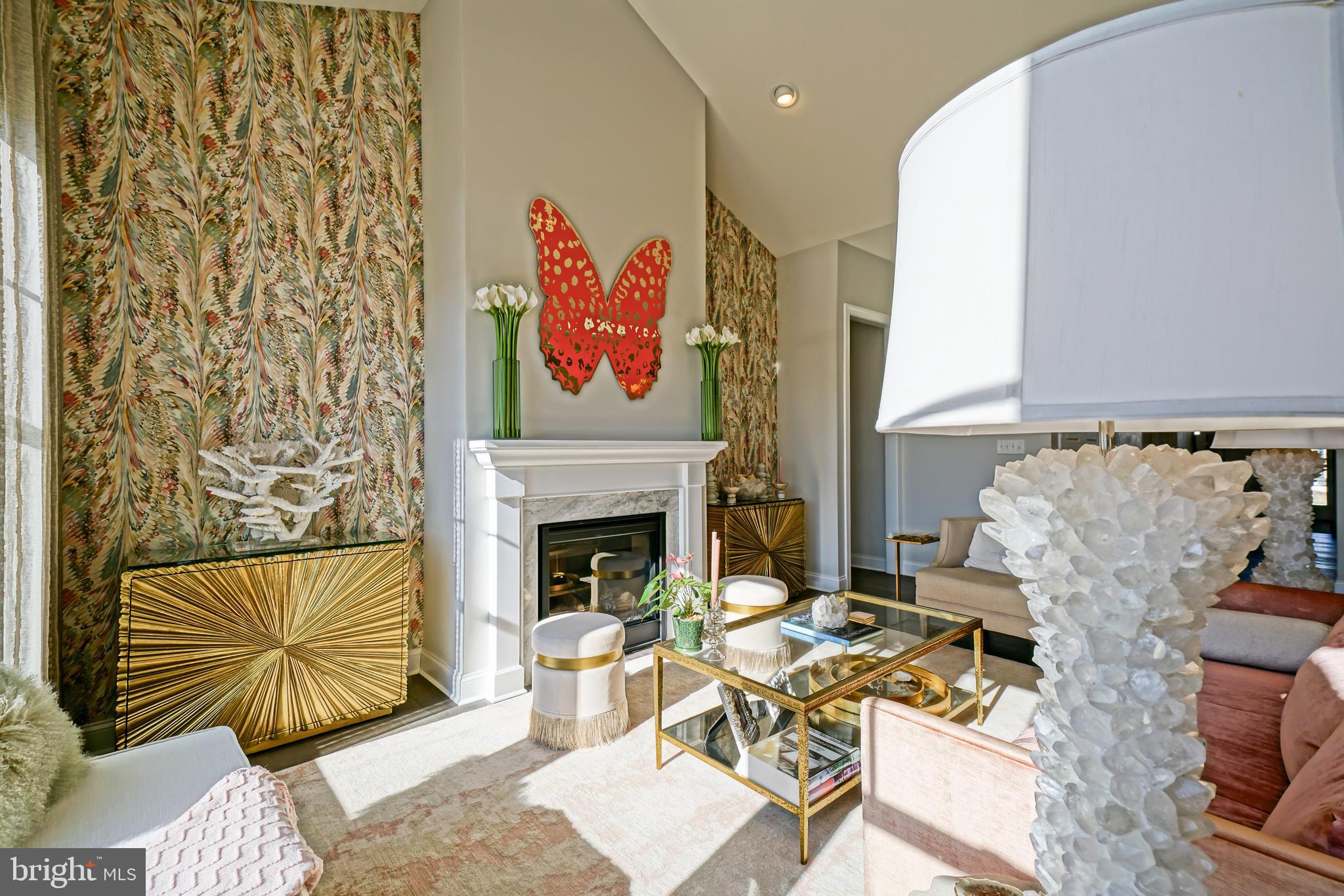 11078 Marvil Road Lewes, DE 19958 - Photo 24 of 98 a living room with furniture and a fireplace