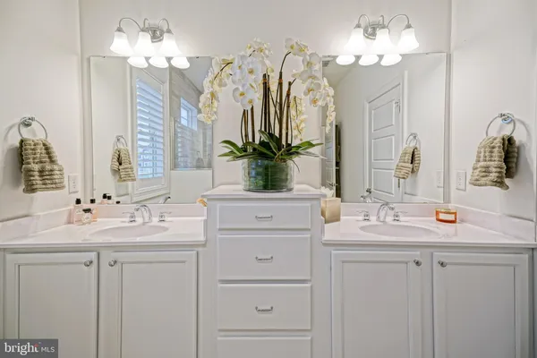 a view of a livingroom with furniture and white walls
