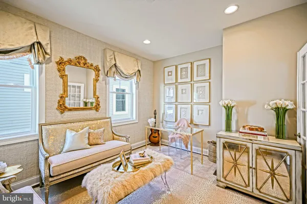 a bathroom with a sink a toilet and shower curtain