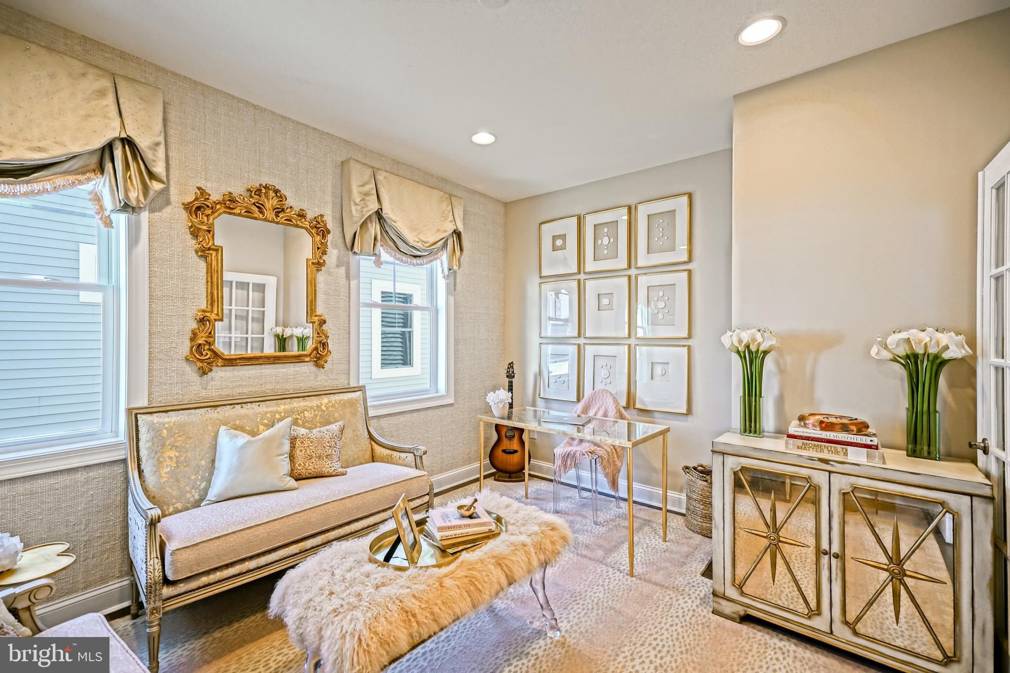 11078 Marvil Road Lewes, DE 19958 - Photo 42 of 98 a living room with furniture a wooden floor and a large window