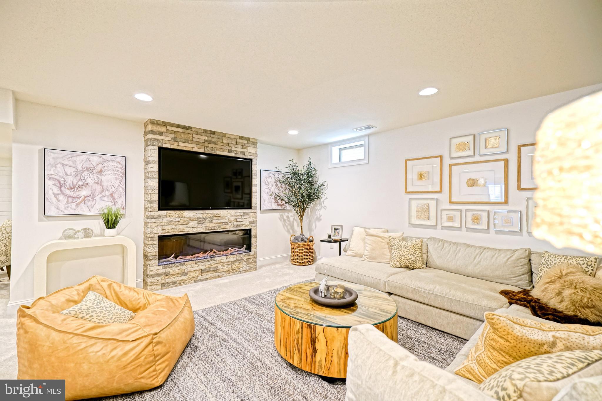11078 Marvil Road Lewes, DE 19958 - Photo 51 of 98 a living room with furniture and a flat screen tv