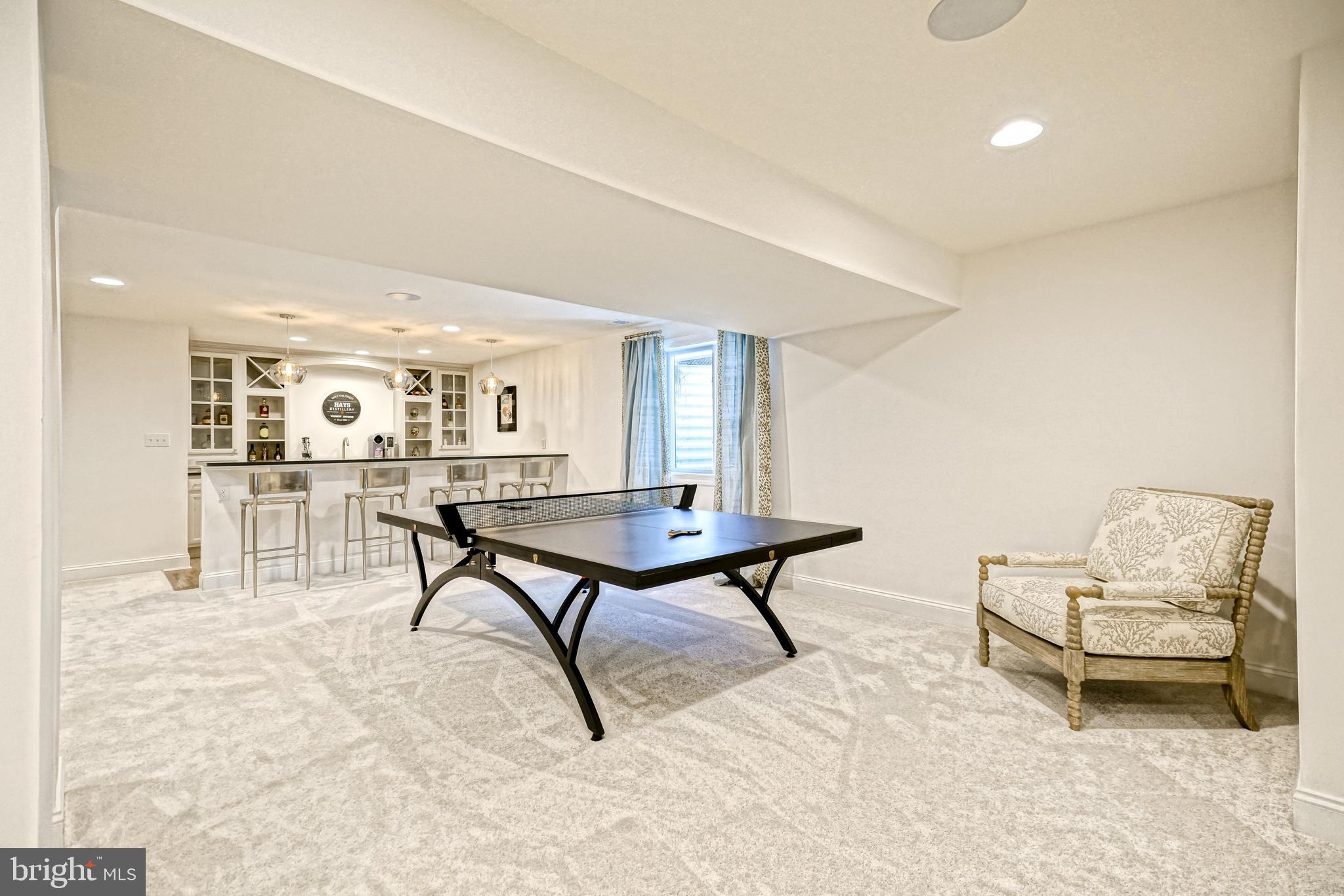 11078 Marvil Road Lewes, DE 19958 - Photo 62 of 98 a living room with furniture and a rug