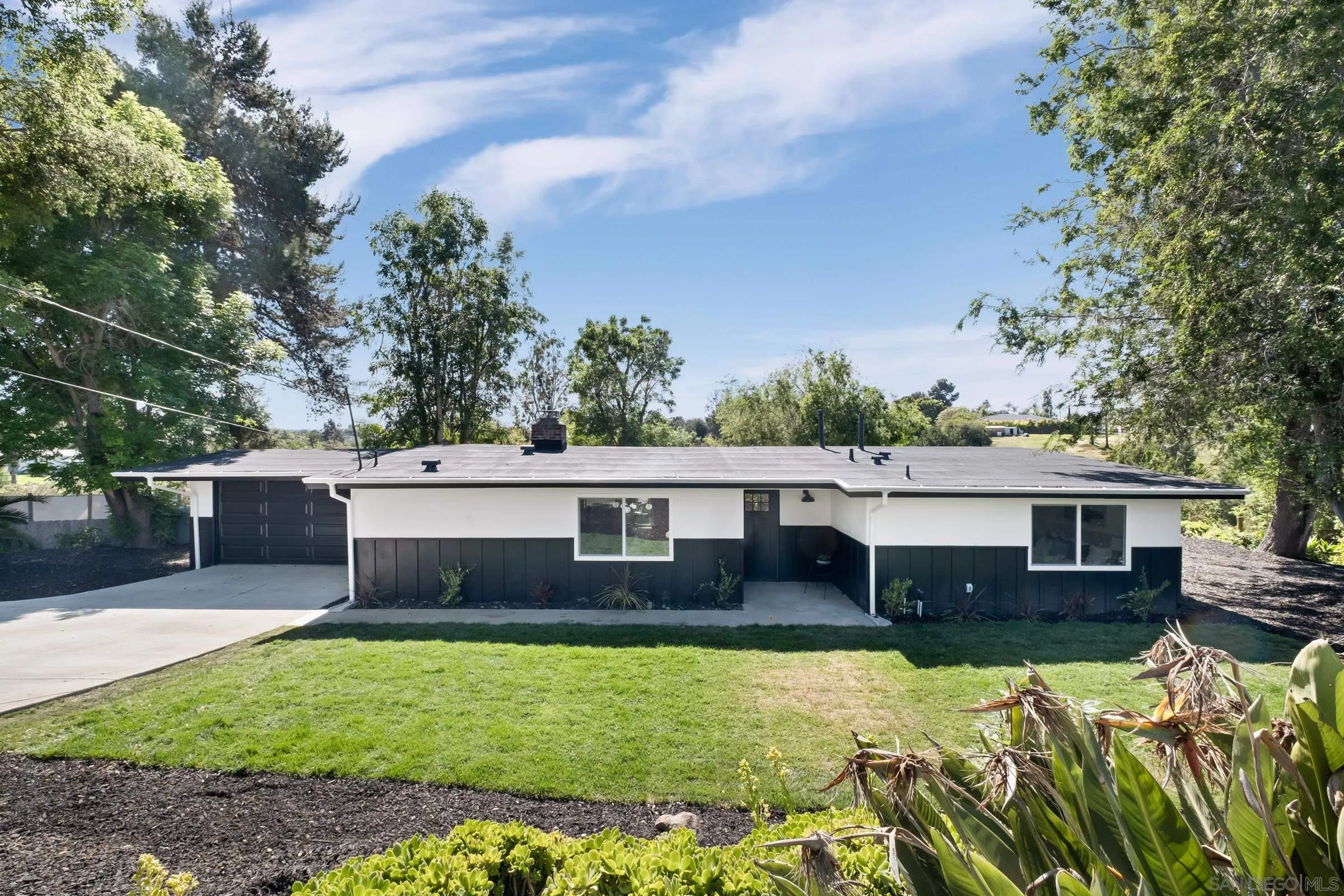 a view of a house with swimming pool
