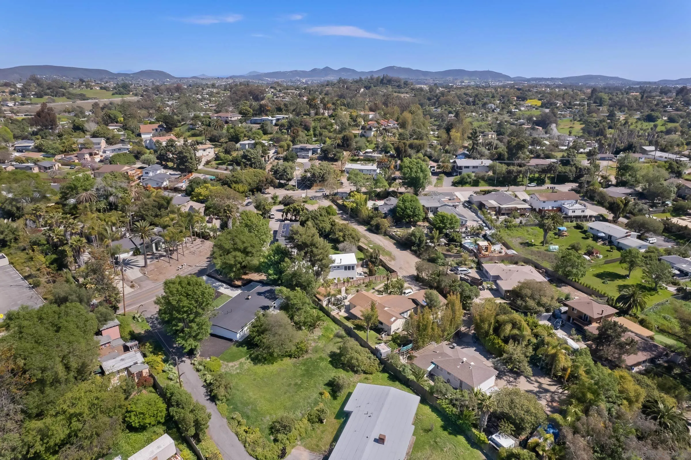557 Sunset Drive Vista, CA 92081 - Photo 35 of 36 an aerial view of a city with lots of residential buildings