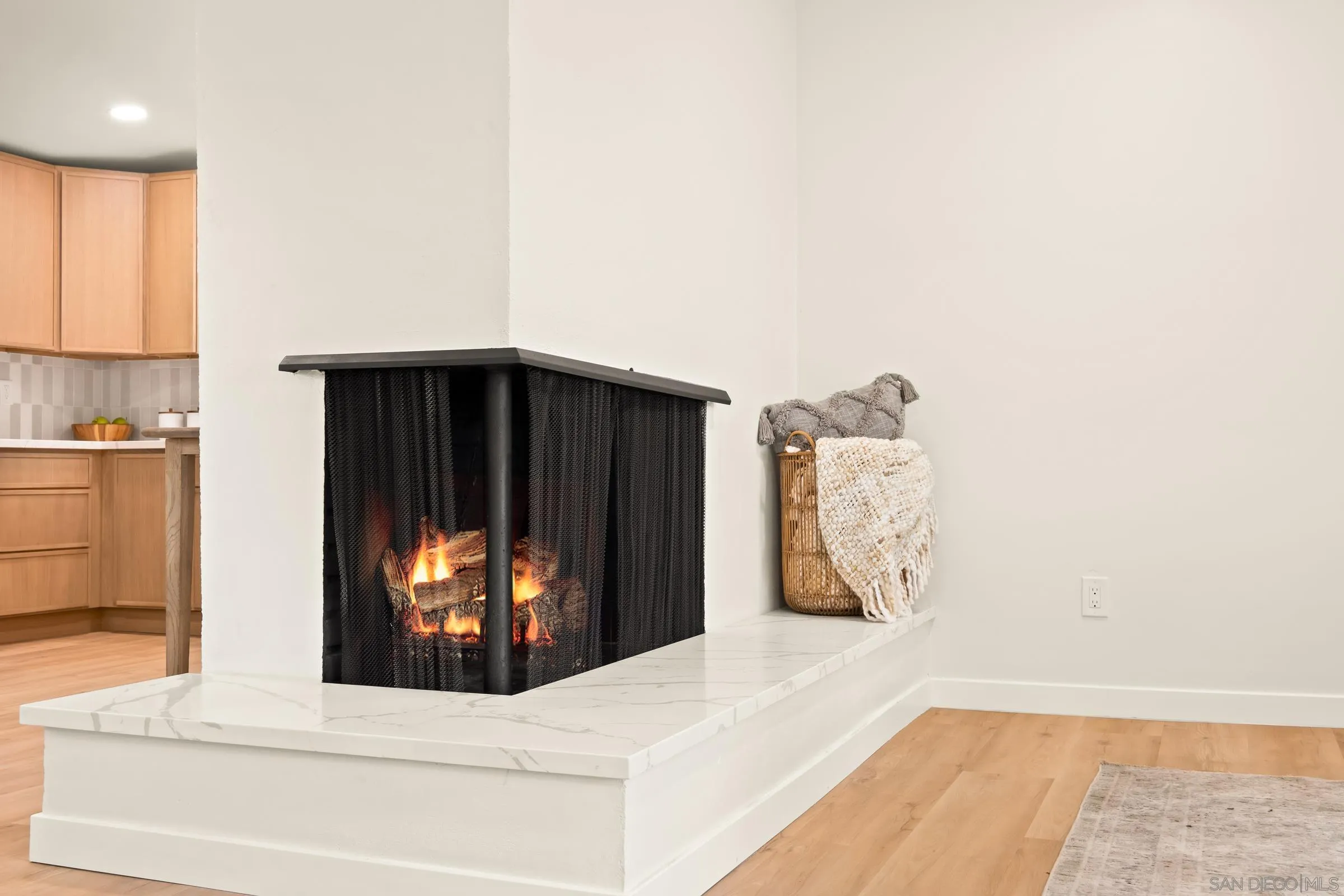 557 Sunset Drive Vista, CA 92081 - Photo 10 of 36 a living room with furniture and a fireplace