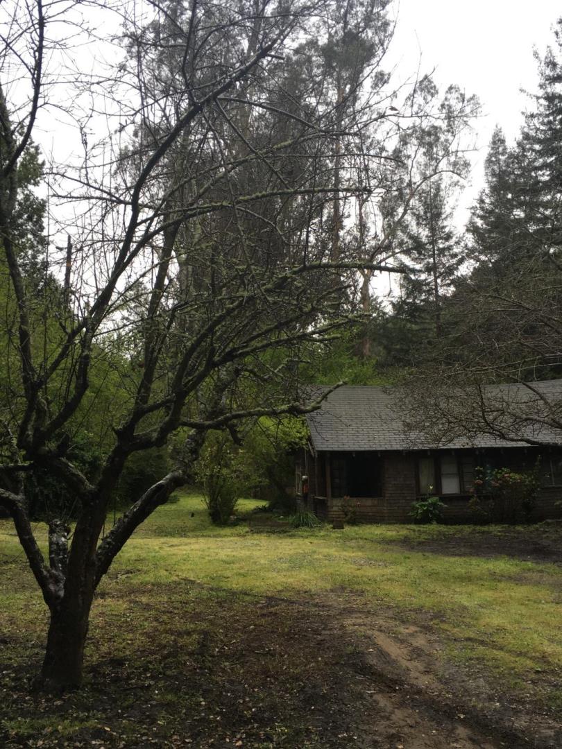 990 North Rodeo Gulch Road Soquel, CA 95073 - Photo 1 of 8 a front view of a house with a yard