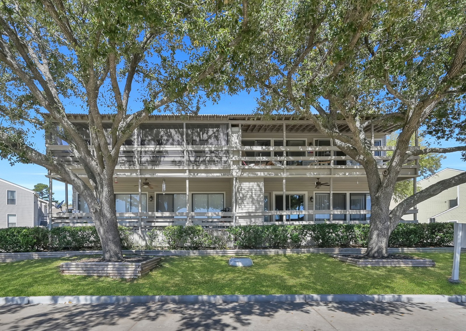 Come home to this beautiful condo in the coveted neighborhood of April Sound & relax in the shade of these beautiful mature trees out back when you get home - or all day on your days off!