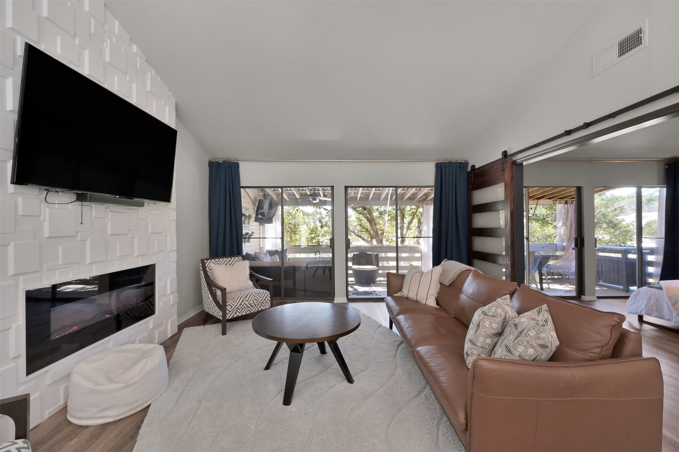 184 April Point Drive North Conroe, TX 77356 - Photo 14 of 41 Get cozy on cold winter days with the electric fireplace