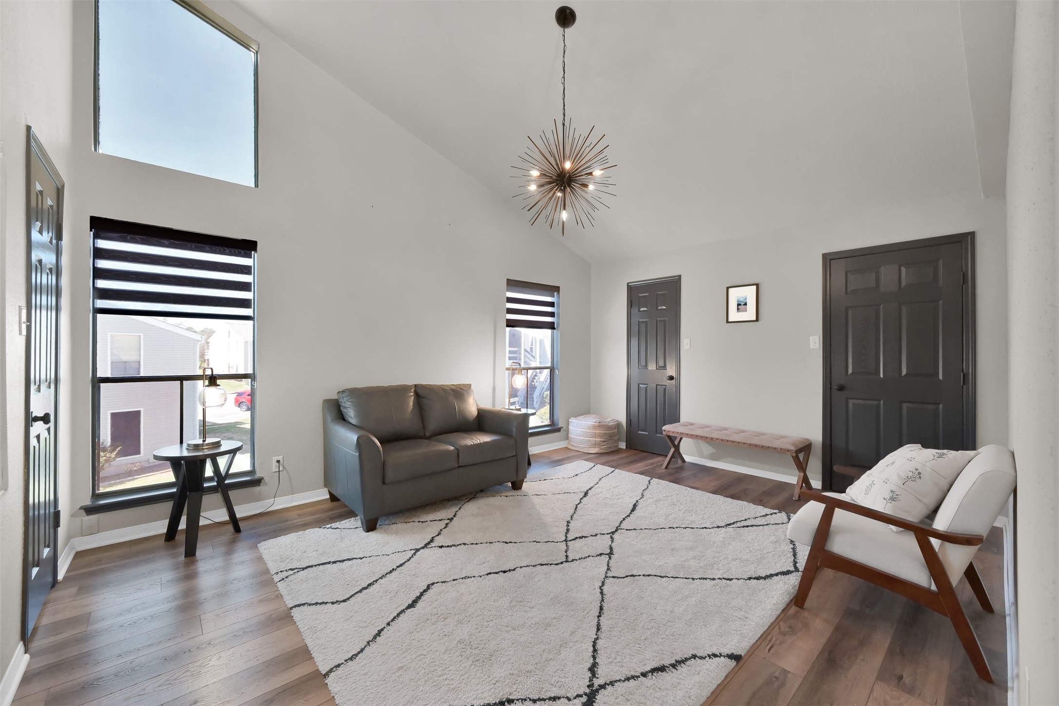 184 April Point Drive North Conroe, TX 77356 - Photo 24 of 41 Secondary bedroom or flex room with laundry closet containing full sized stackable washer & dryer