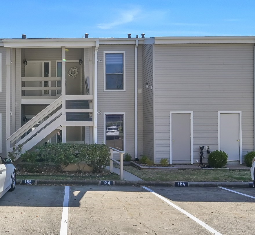 184 April Point Drive North Conroe, TX 77356 - Photo 33 of 41 Parking is convenient just out front of the condos, with 2 spaces and storage