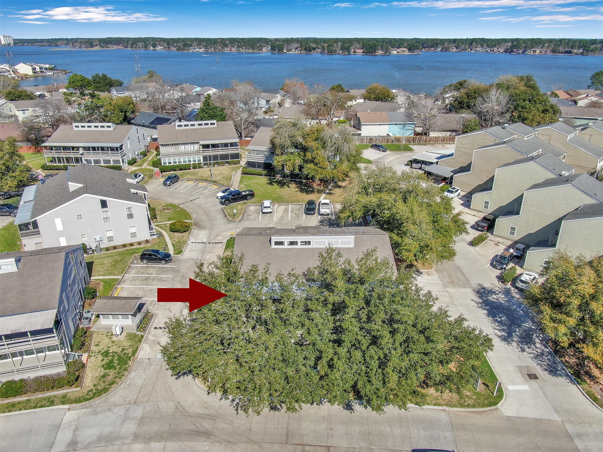 184 April Point Drive North Conroe, TX 77356 - Photo 35 of 41 This property is flanked by nice, mature evergreen shade trees, which also provide privacy on the back patio