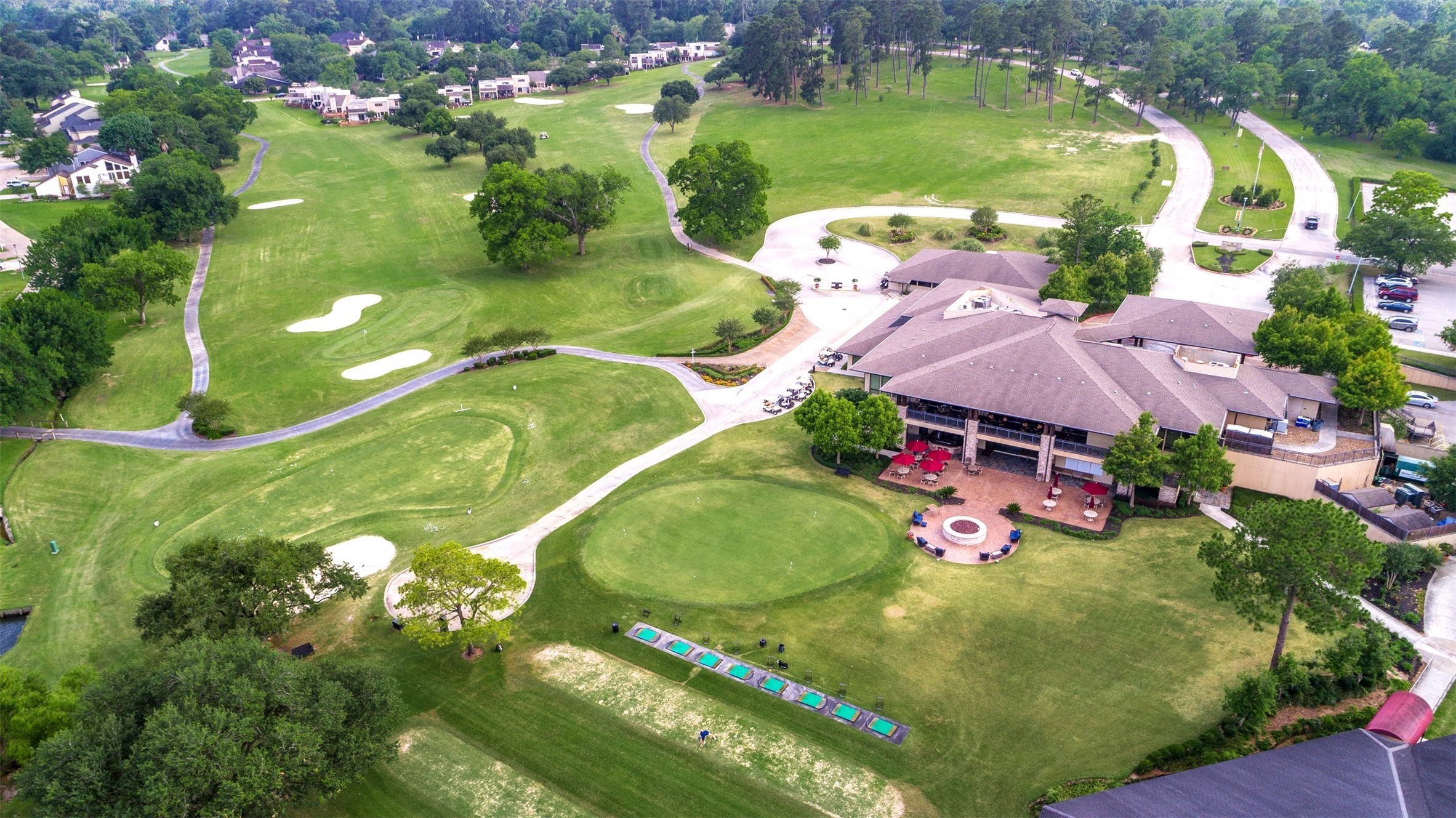 184 April Point Drive North Conroe, TX 77356 - Photo 38 of 41 The back of the country club is where they host the monthly bands or other fun community wide events, in addition to the live music on Friday nights inside the club