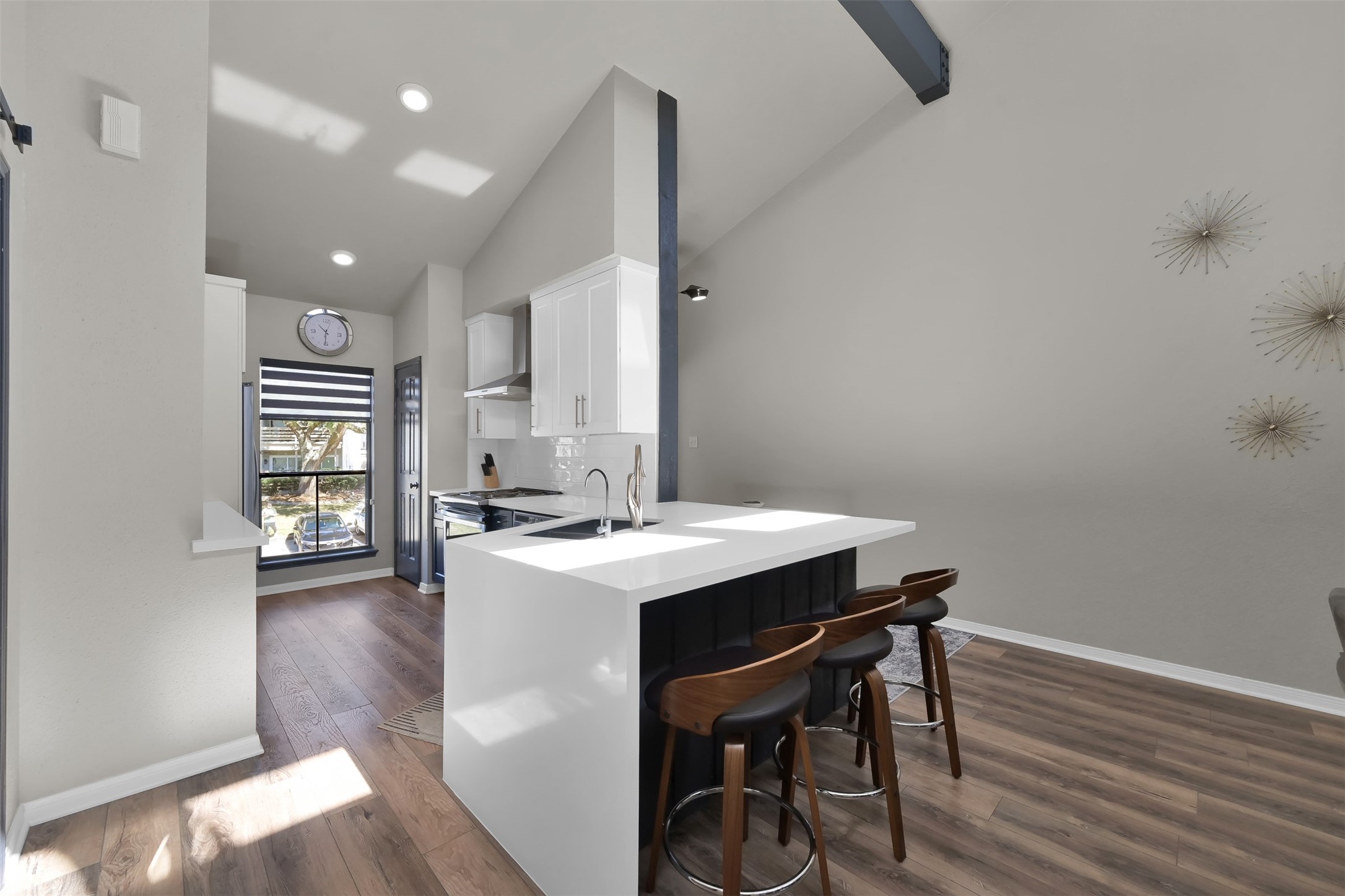 184 April Point Drive North Conroe, TX 77356 - Photo 6 of 41 The kitchen has space for barstools and eating at the bar