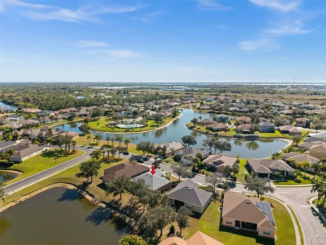 an aerial view of a city with lots of residential buildings