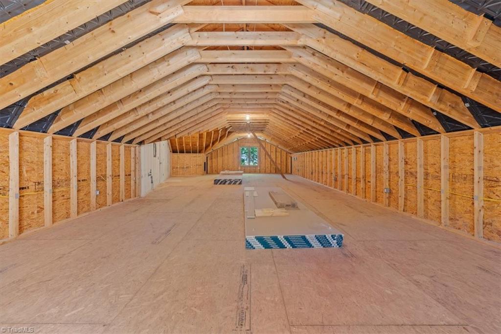2207 Sierra Trace Road Denton, NC 27239 - Photo 40 of 49 Expansive unfinished upper-level space offering endless possibilities for future expansion or storage