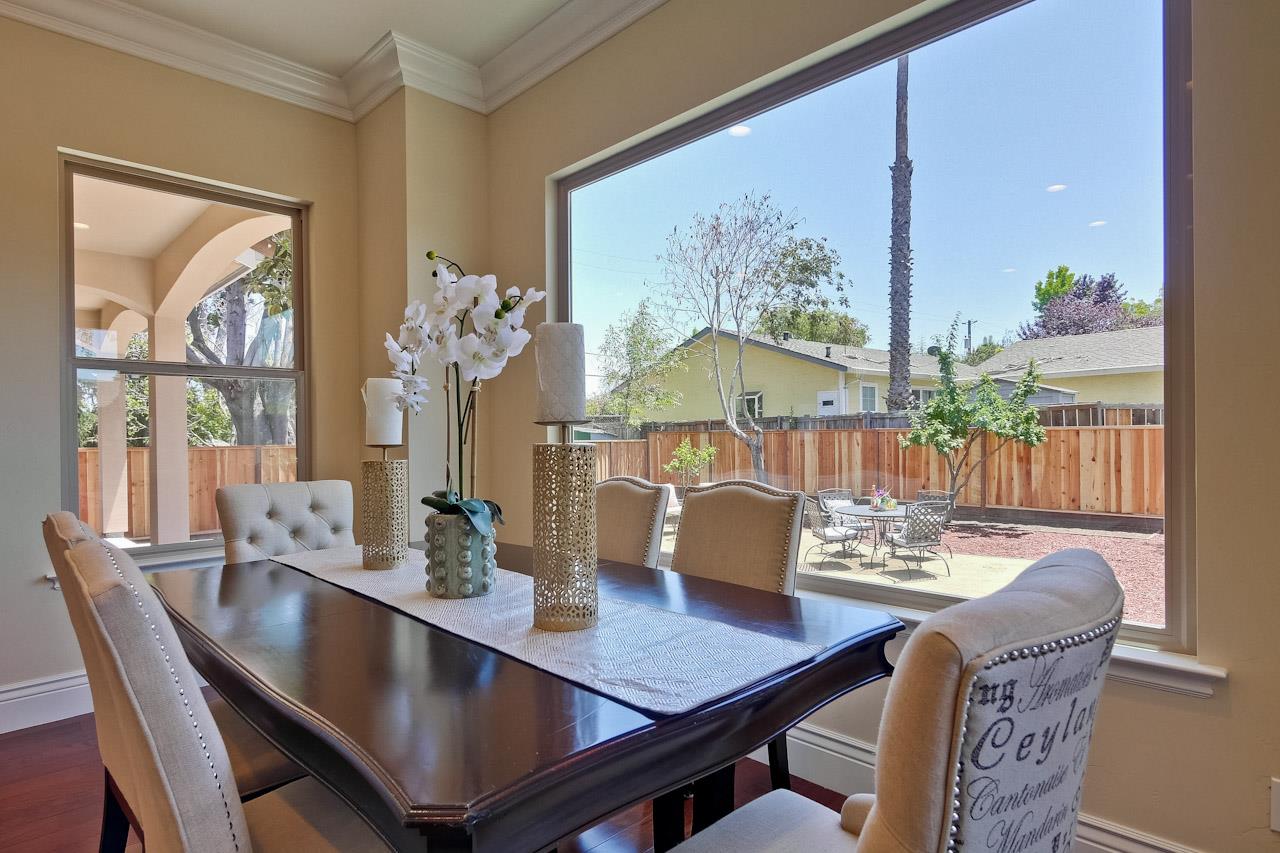 932 Marion Way Sunnyvale, CA 94087 - Photo 15 of 47 a dining room with furniture and wooden floor